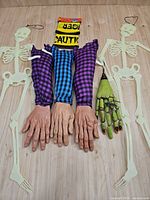 Full layout of skeletons, arms, hand and caution tape
