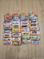 Overview of 21 carded Matchbox vehicles arranged in three columns