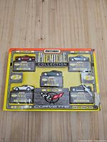Front view of boxed set displaying six Corvette cars in blister packs