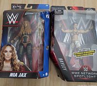 Front of both boxed figures showing characters and accessories