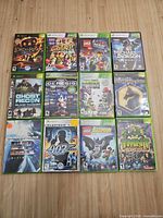 All 12 game cases laid out in four-by-three grid