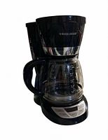 Front view of coffee maker showing carafe and control panel