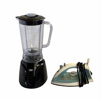 Blender and iron side by side