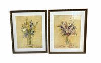 Front view of both framed floral prints showing artwork, frames, and mats