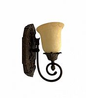 Side view showing tortoise-shell finish metal sconce and marbled glass shade