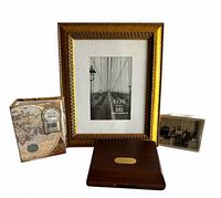 Group showing gold frame, wooden box, map design box, acrylic photo block