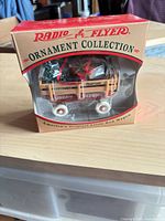 Front of boxed Radio Flyer Little Red Wagon ornament