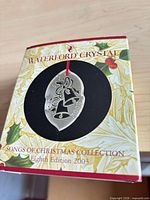 Front of outer sleeve showing ornament design and edition info