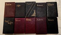 Front covers of all ten leather-bound Victorian poetry books