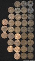 Obverse sides of 43 pennies showing monarch portraits