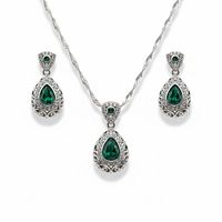 Front view of necklace and both earrings showing design and matching stones