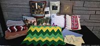 Group shot of pillows, blankets, pillowcases and dust ruffle
