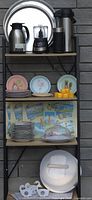 Overview of shelving showing appliances, plates, cups, décor