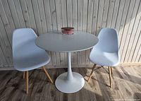 Front view of table and two chairs
