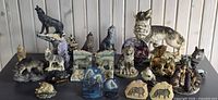Full lot overview showing all wolf figurines and plaques