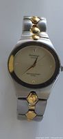 Front view of watch showing dial, bezel and bracelet