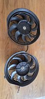 Front view of both fan assemblies showing blades and housings