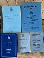 Front covers of all five booklets laid out