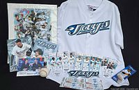 Full lot view showing jersey, tickets, poster, photos, decal and schedule
