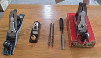 Group shot showing Stanley plane, Darex block plane, Rapier 400 plane with box, chisel, three auger bits