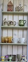 Full shelving view showing majority of items grouped on four shelves
