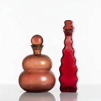 Both decanters side by side showing shapes and color