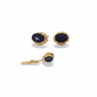 Front view of two cufflinks and tie tack displaying cabochons and gold-tone settings