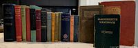 Front view of 17 assorted vintage hardcover books standing in a row