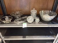 All serveware pieces on shelf