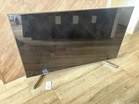 Front view of Sony flat-panel TV on stand