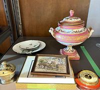Group shot of urn, plates, framed print, brass pot and barometer