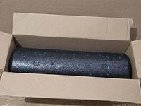 Foam roller inside original cardboard box