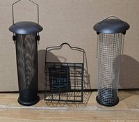 Front view of all three metal bird feeders