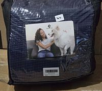 Packaged CHUN YI slipcover in zippered bag showing brand card