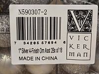 Close-up of manufacturer label showing model N590307-2 and product details