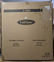 Front of boxed Uniflame S-1060 fireplace screen