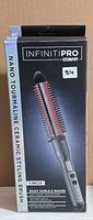Front of boxed Conair InfinitiPro Nano Tourmaline Ceramic Styling Brush