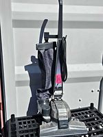 Full front view of Kirby G4 vacuum with cord and bag visible