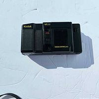 Front view showing Kodak VR35 K12 camera body and lens cover