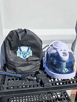 Vacuum canister, accessory bag, wand, floor head