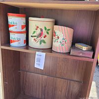 Shelf view showing all tins and jewellery box