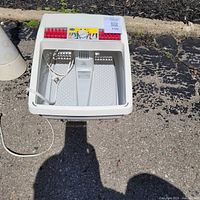 Top view of Dr. Scholl's foot spa showing interior features and power cord