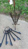 Umbrella stand upright, keys laid out to show scale and design