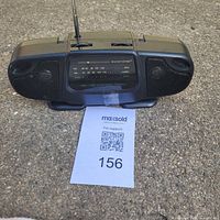 Front view showing complete radio with antenna and speakers