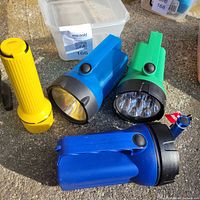 All four flashlights on ground