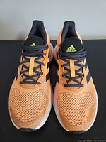 Top view of both shoes showing mesh uppers and lacing