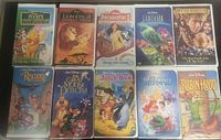 Front covers of ten Disney clamshell VHS tapes displayed in two rows