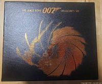 Front of black slipcase with gold 007 graphic