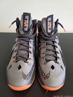 Top view of both shoes showing colourway, laces and logo