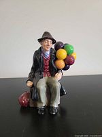 Front view of figurine showing overall design and colours